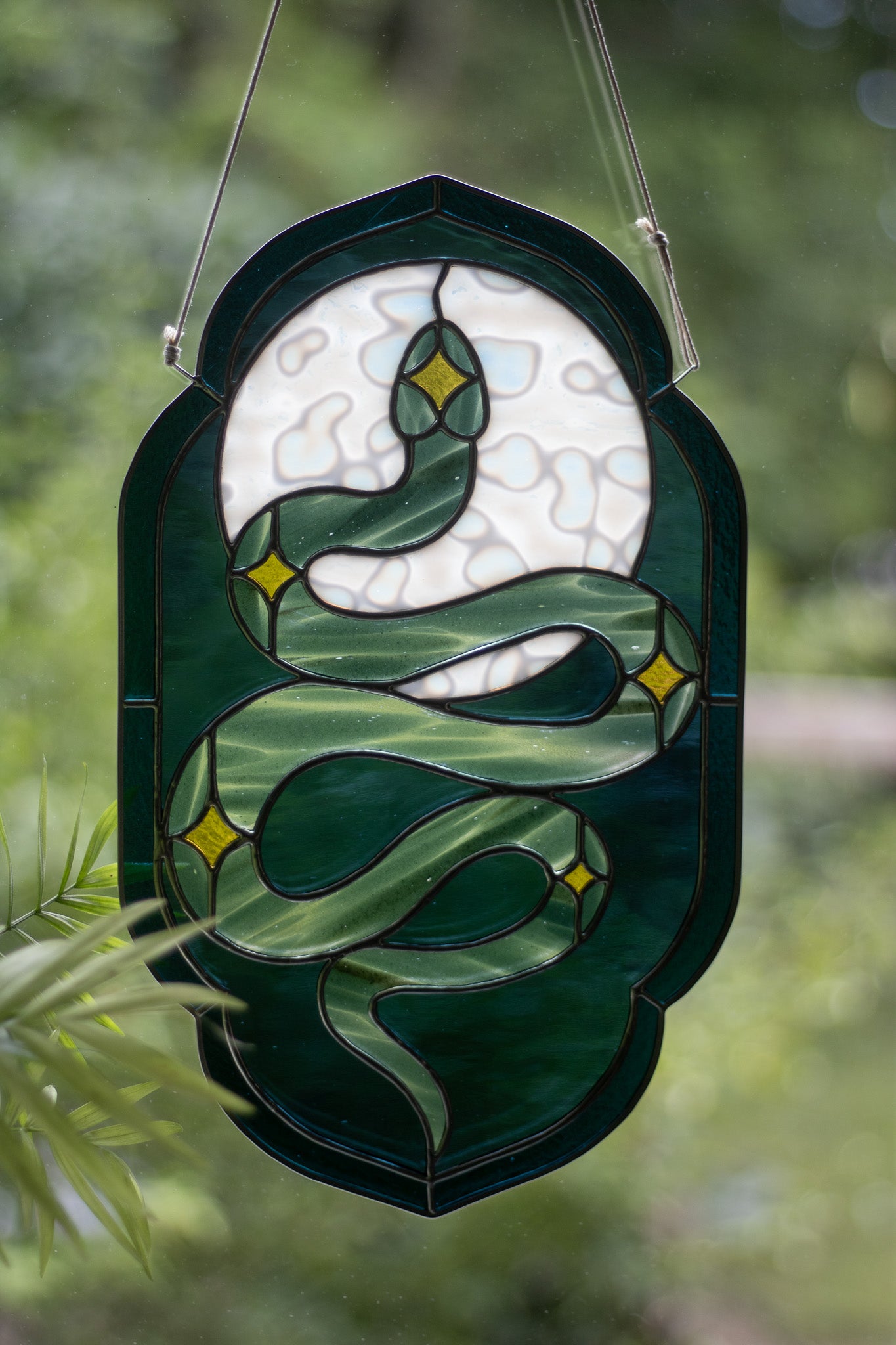 Snake stained outlet glass suncatcher